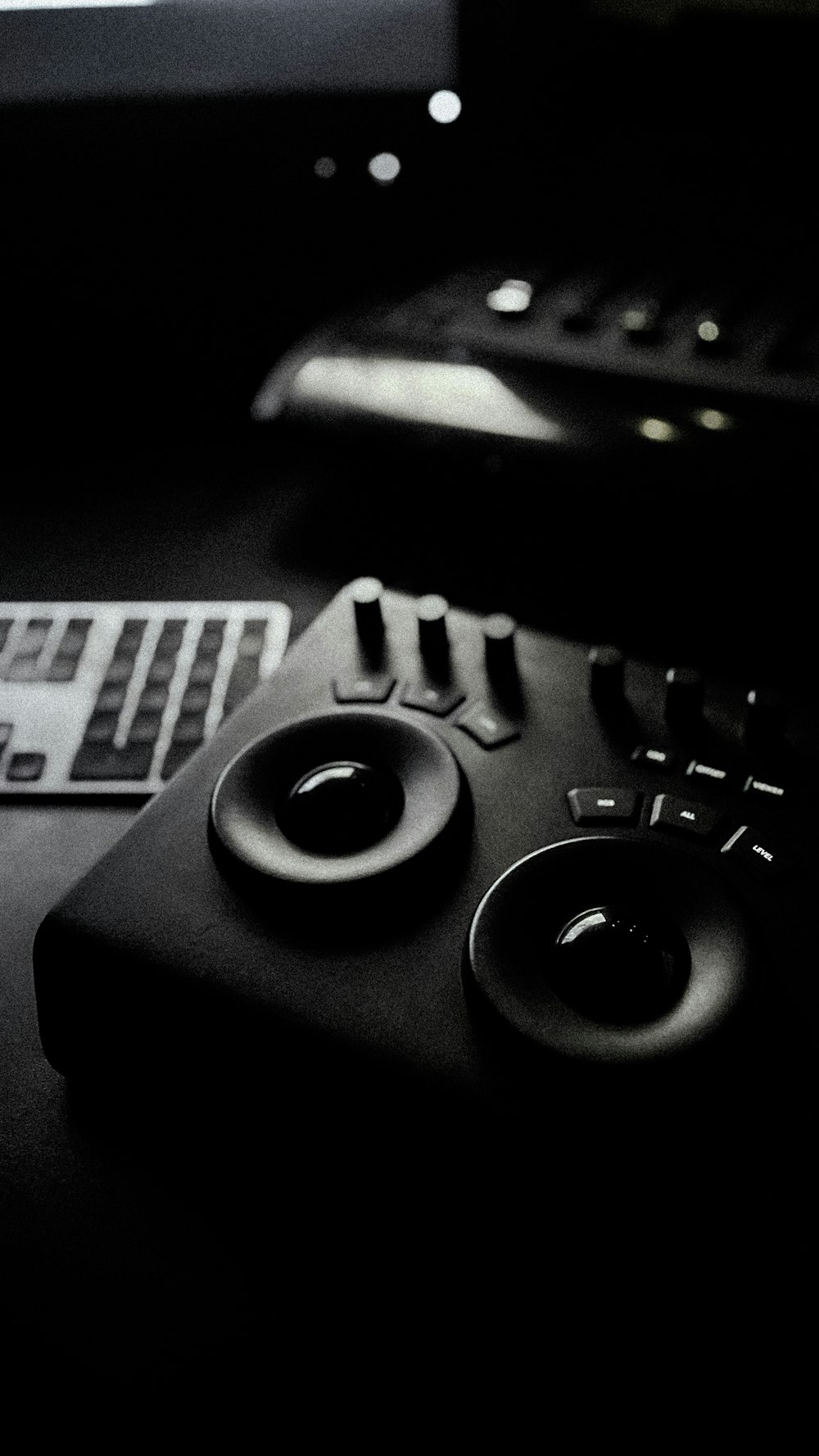 a black and white photo of a remote control