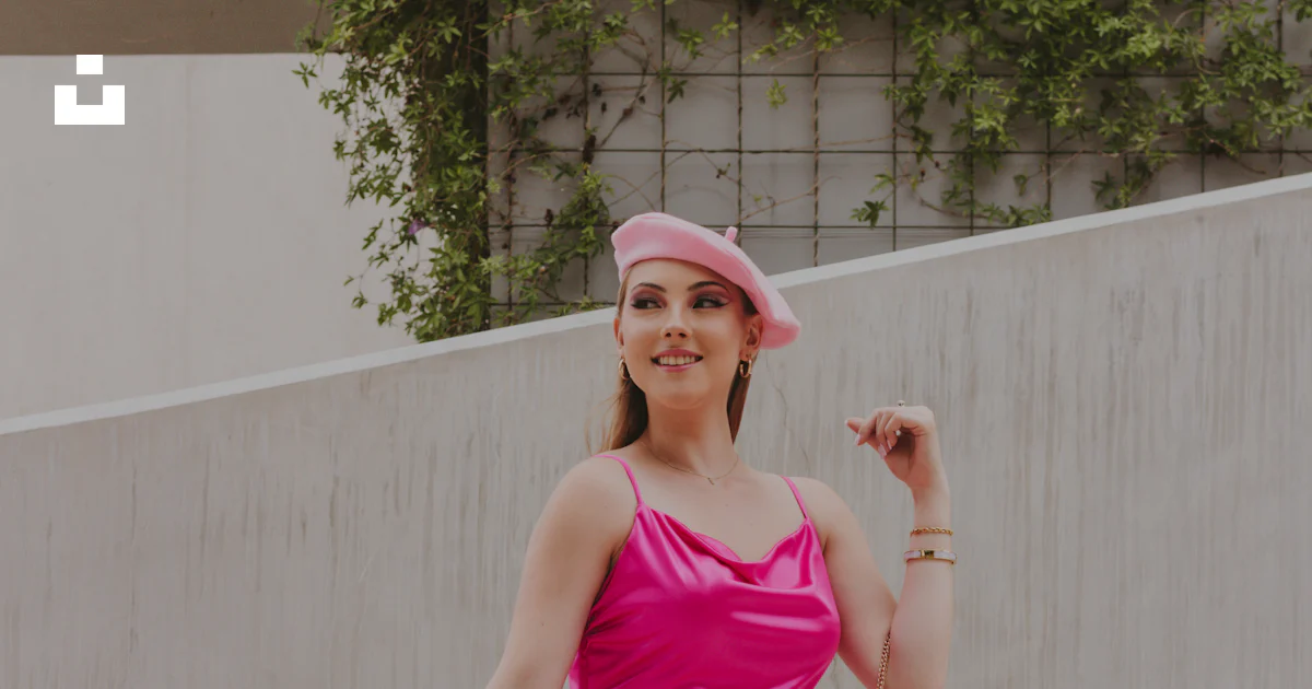 A woman in a pink dress and pink hat photo – Free Costa rica Image on ...