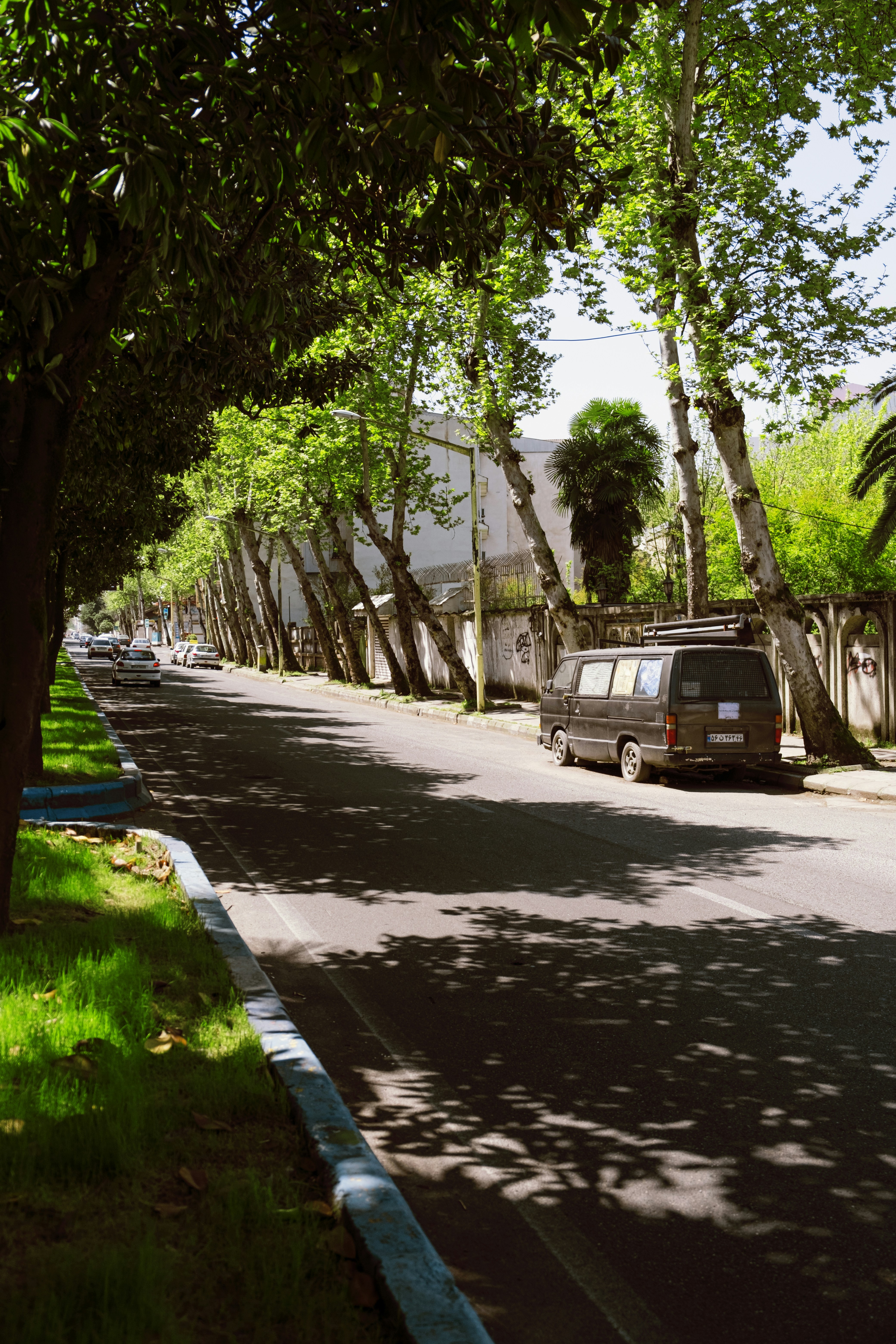 a van is parked on the side of the road