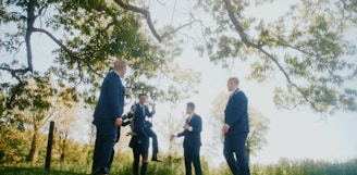 a group of men standing next to each other