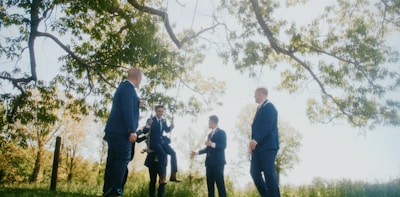 a group of men standing next to each other
