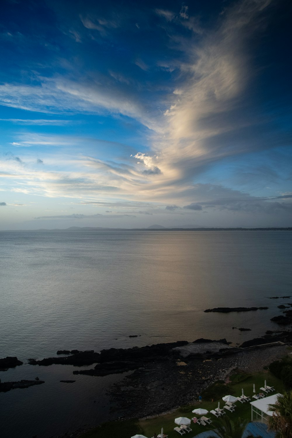 a view of a body of water from a hill