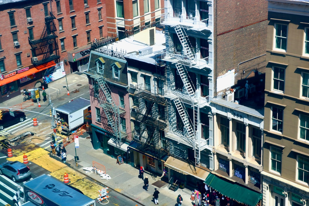 an aerial view of a city street and buildings