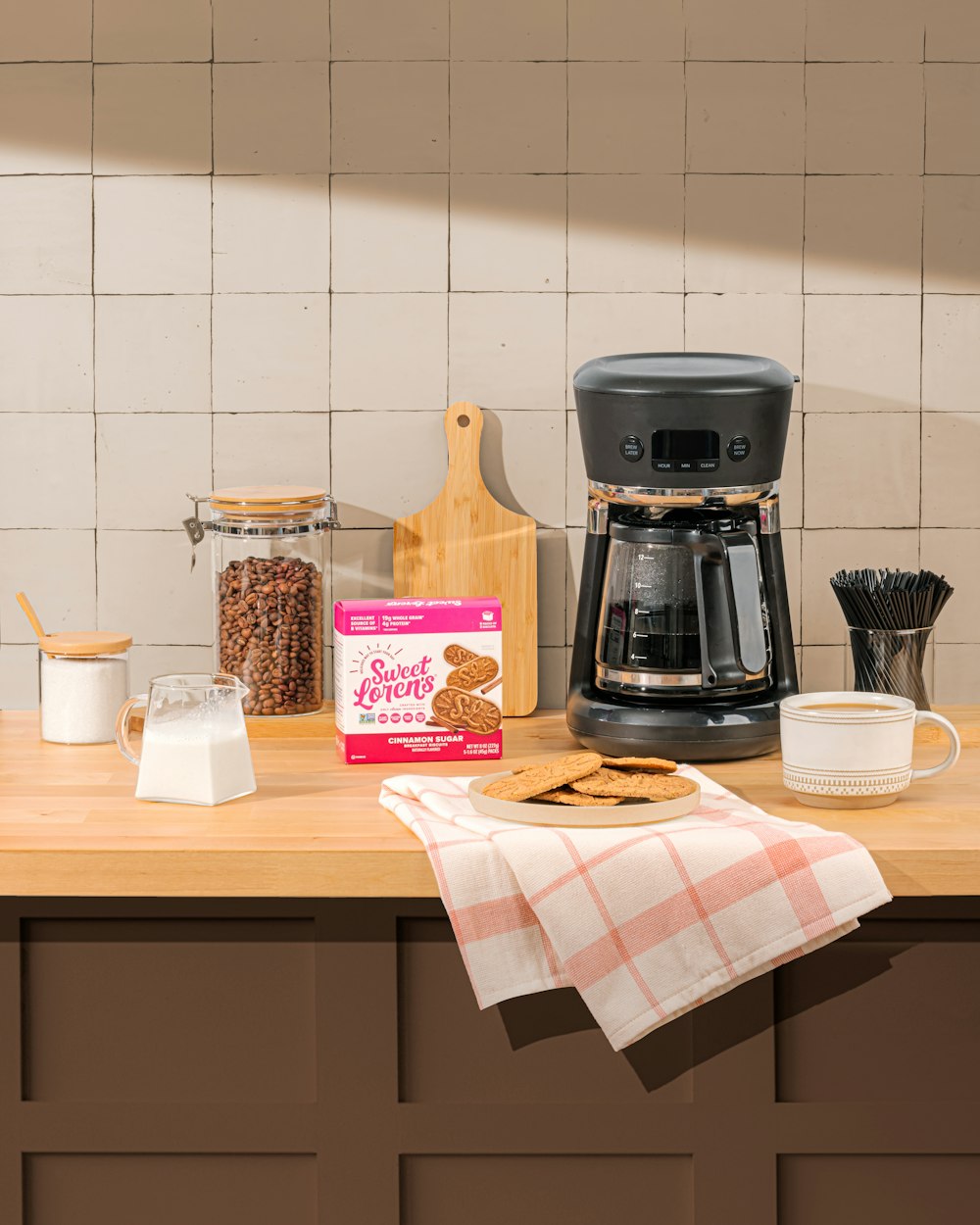 a coffee maker sitting on top of a wooden counter