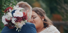 a bride and groom share a moment together