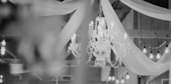 a chandelier hanging from the ceiling of a room