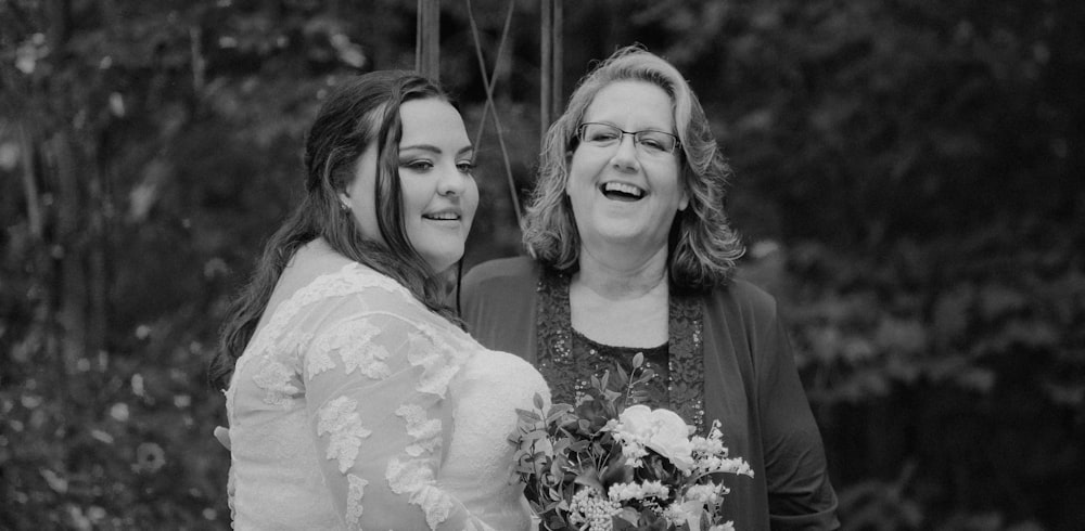 a couple of women standing next to each other