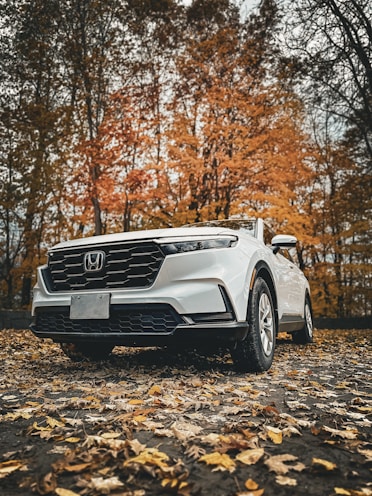 215/65 r16 tyres on a white honda crv car 