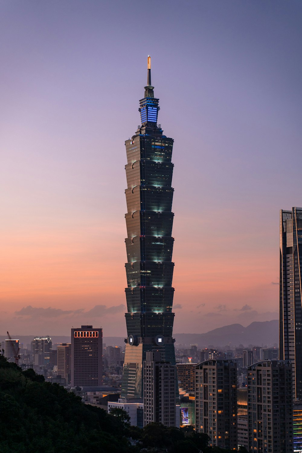 a tall tower with a clock on the top of it