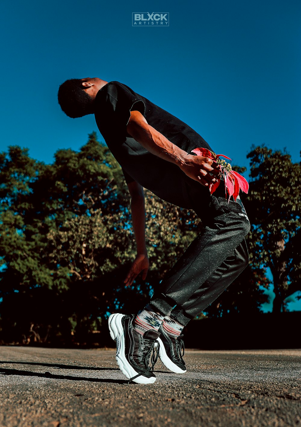 a man is doing a trick on a skateboard