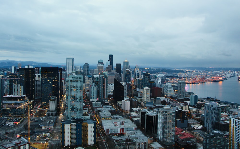 a view of a city at night from the top of a building