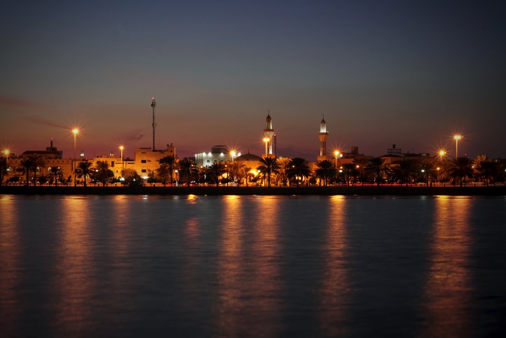 a view of a city at night from across the water