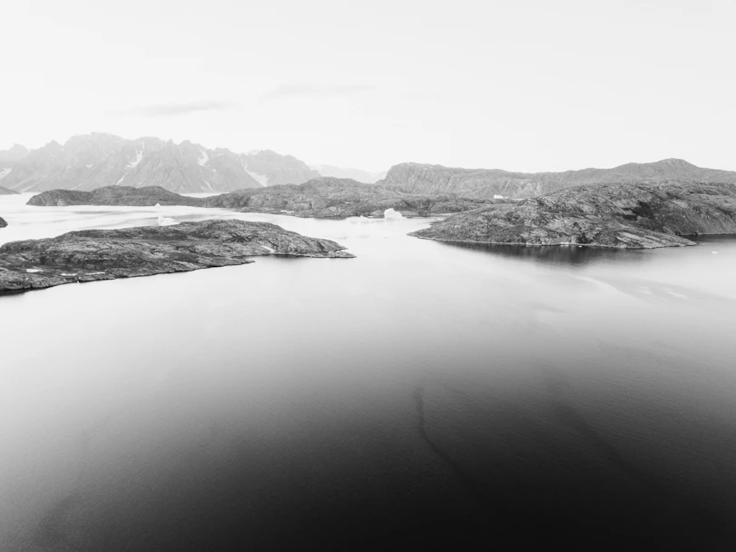 a large body of water surrounded by mountains