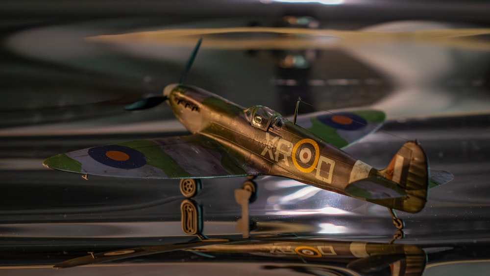 a model airplane sitting on top of a table