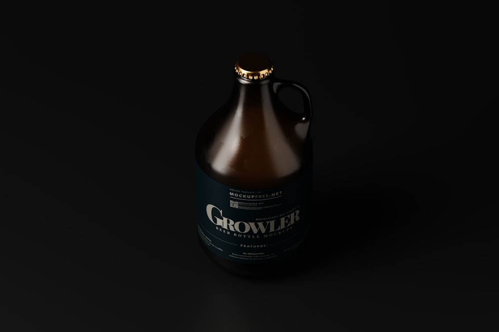 a bottle of growl beer on a black background