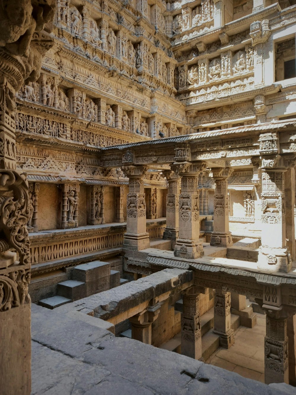 a building with a pool of water in the middle of it