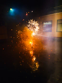 a firework in the middle of a street at night