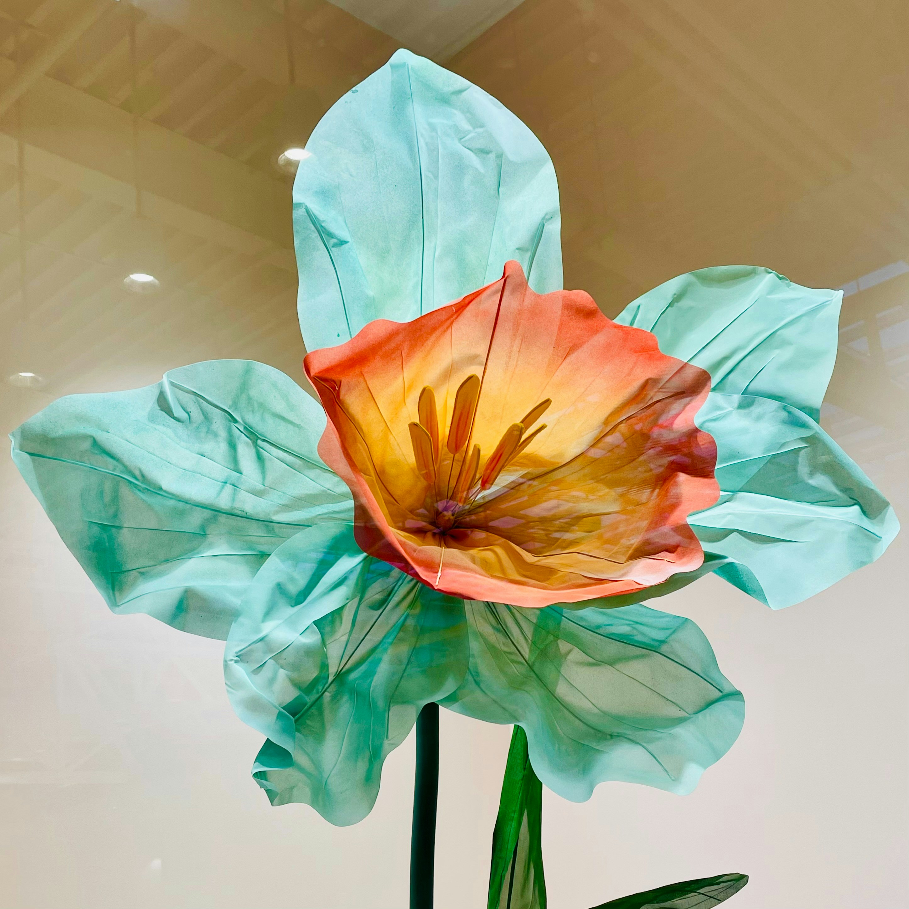 woman wearing yellow long-sleeved dress under white clouds and blue sky during daytime