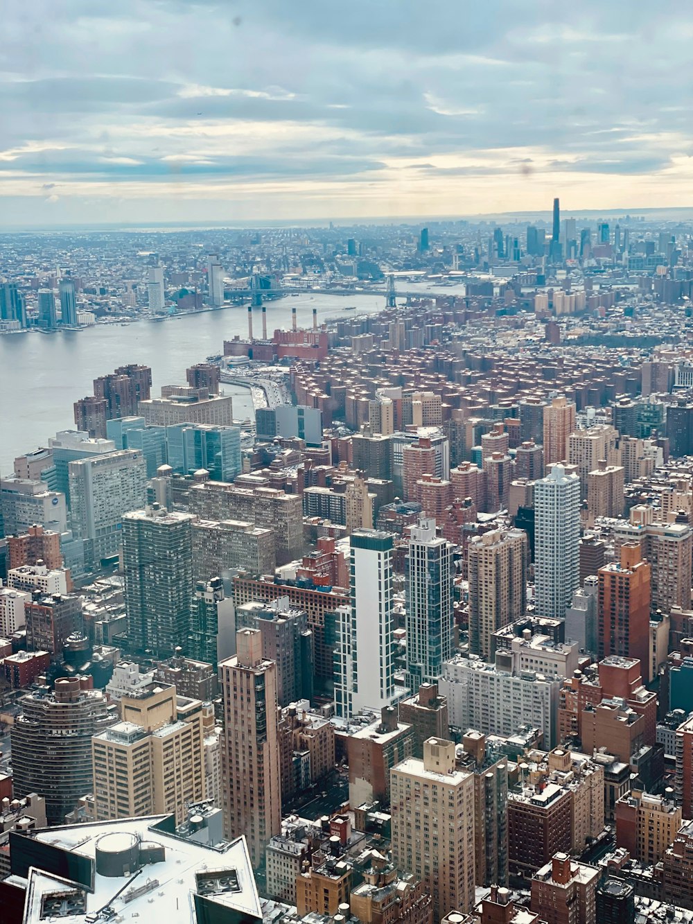 a view of a city from the top of a building