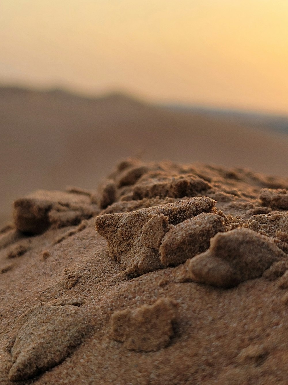 a close up of sand on a beach