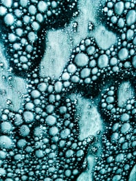 a close up view of water bubbles on a surface