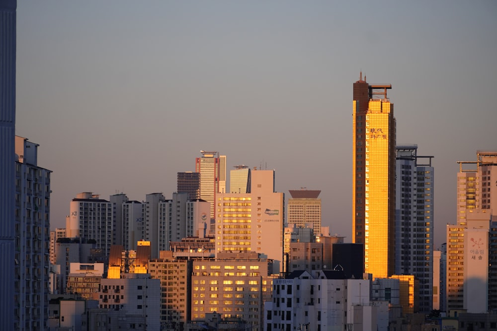 a view of a city with tall buildings