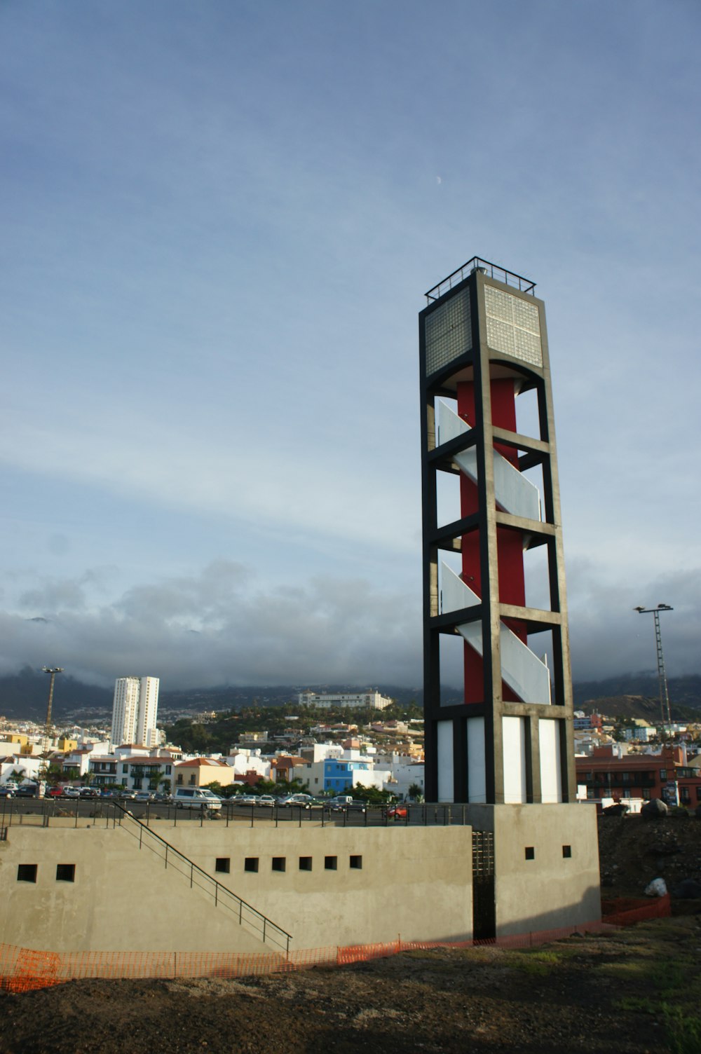 a tall tower with a clock on top of it