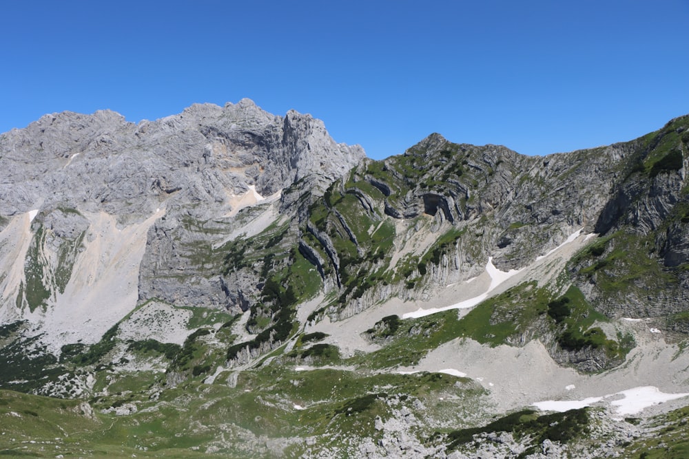 a view of a mountain range in the mountains