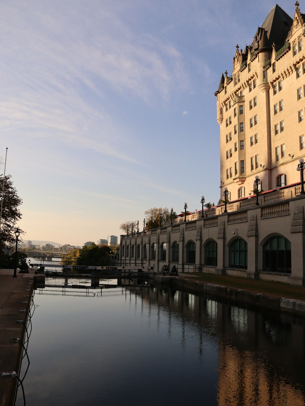 a large building next to a body of water