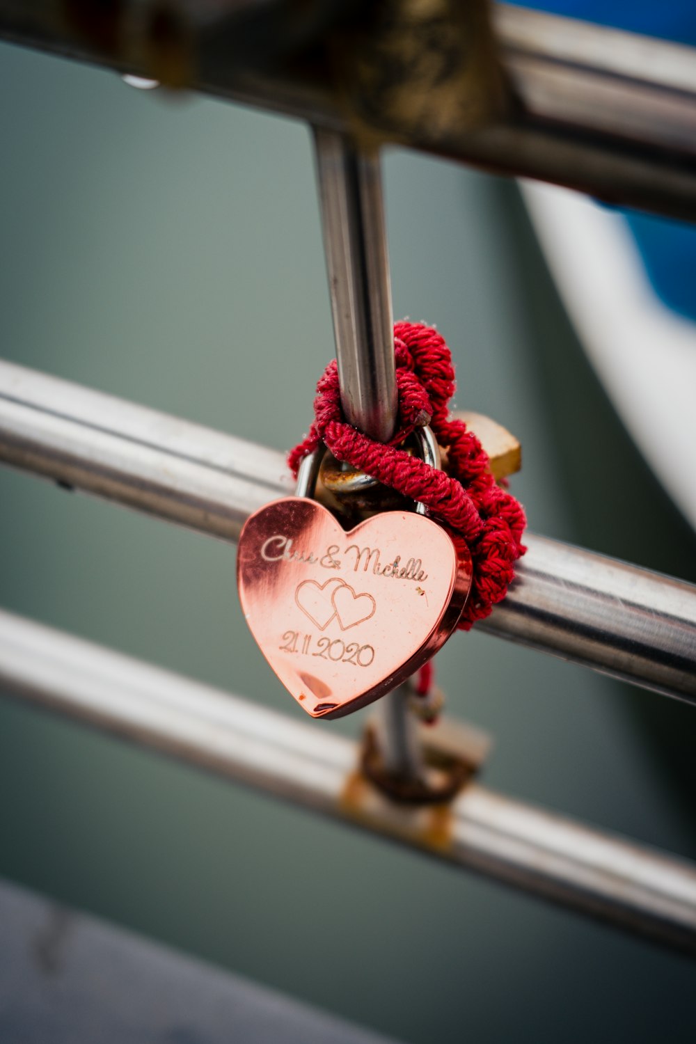 a close up of a heart shaped padlock