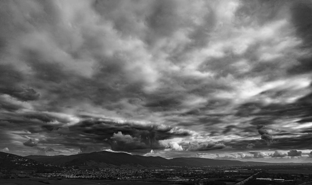 a black and white photo of a cloudy sky