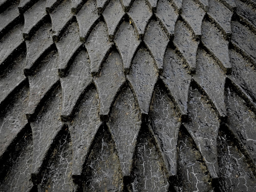 a close up of a building made out of cement