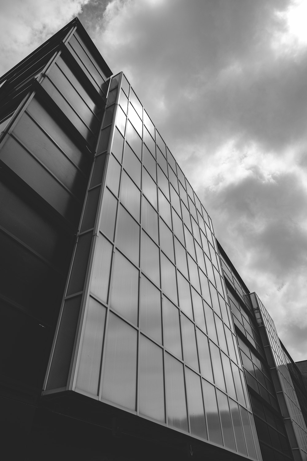 a black and white photo of a tall building