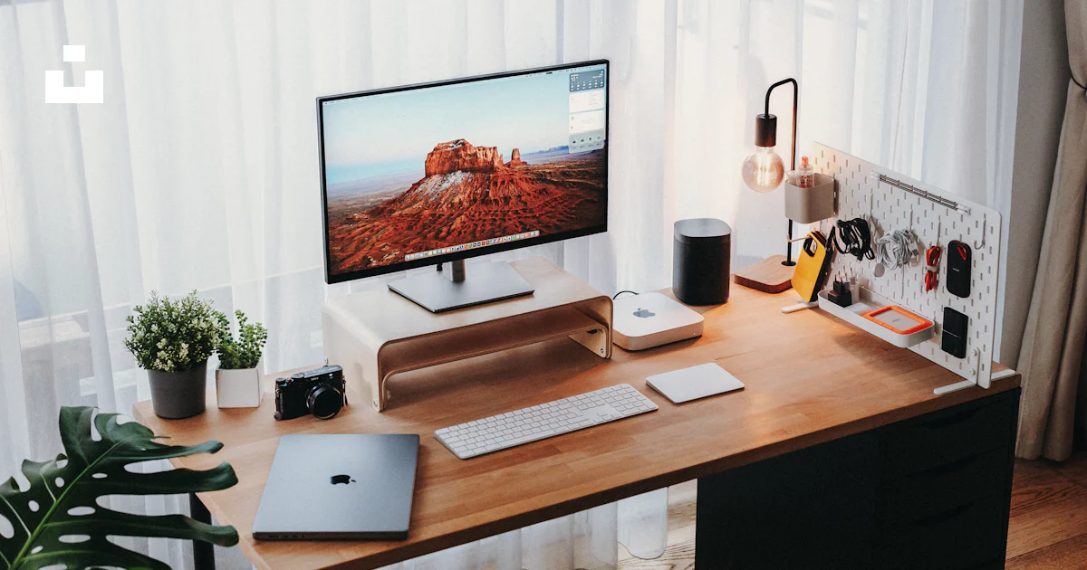 Computer On Top A wooden desk with a computer on top of it photo – Free Desk Image on ...