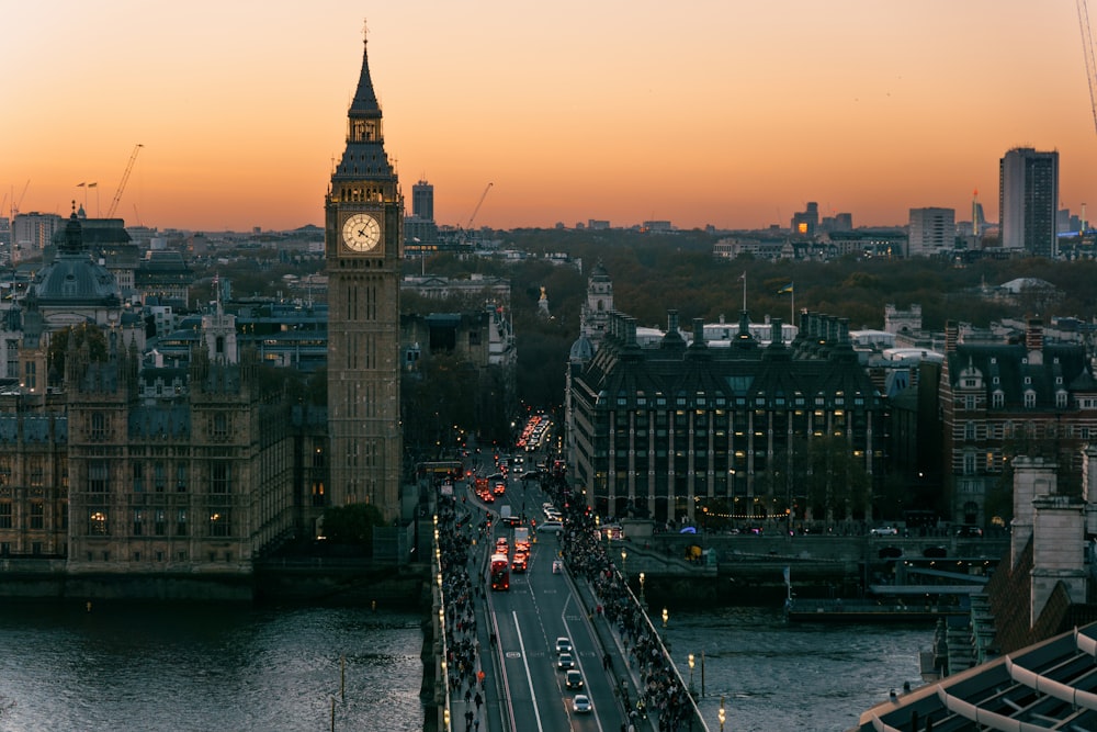 a large clock tower towering over a city