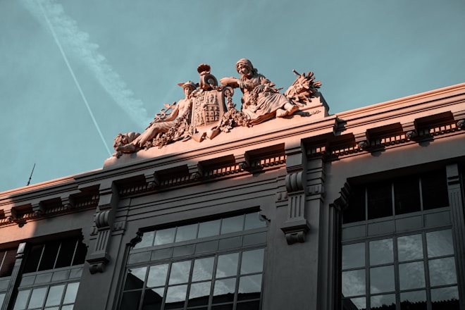 A building with a statue on top of it