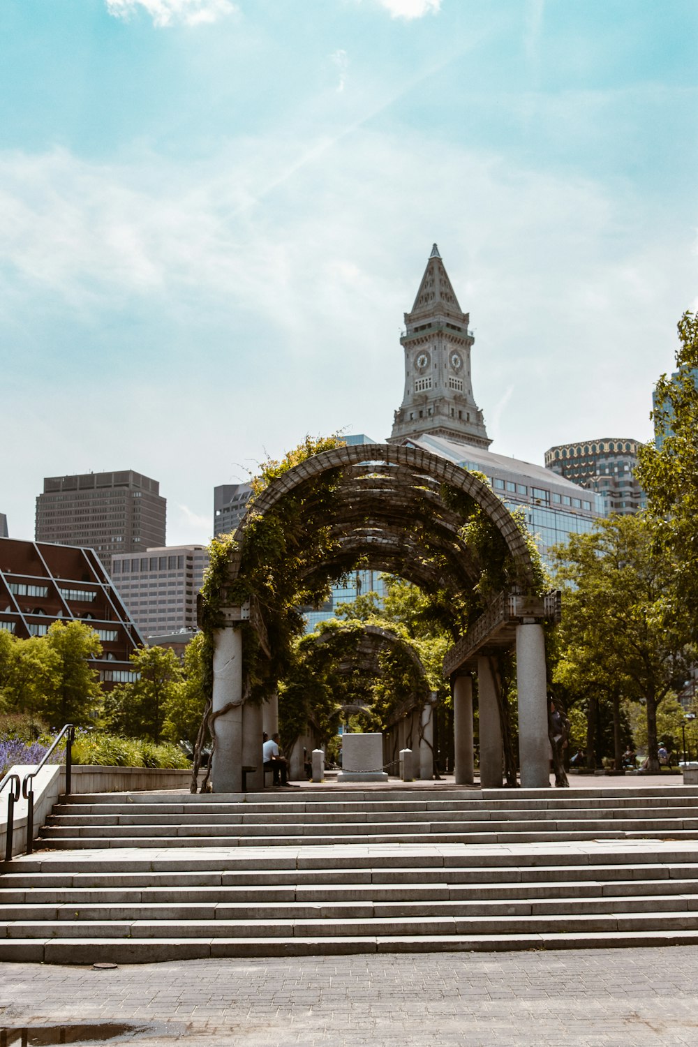 a group of steps leading up to a clock tower