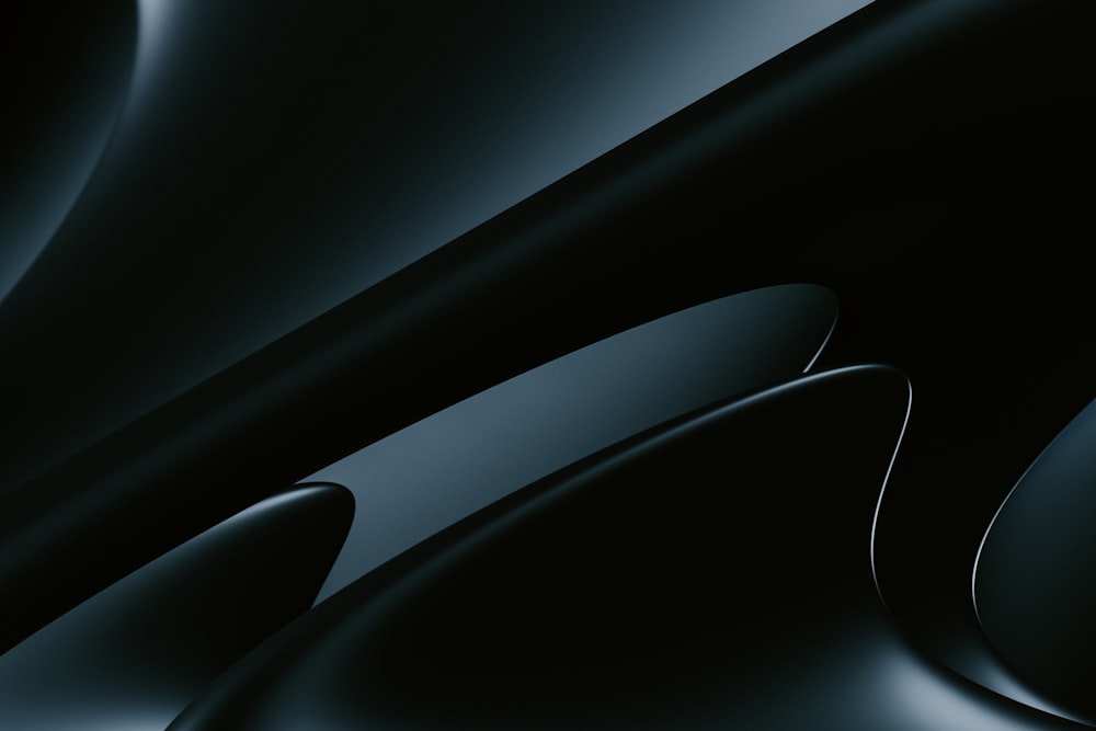 a close up of a black background with curves