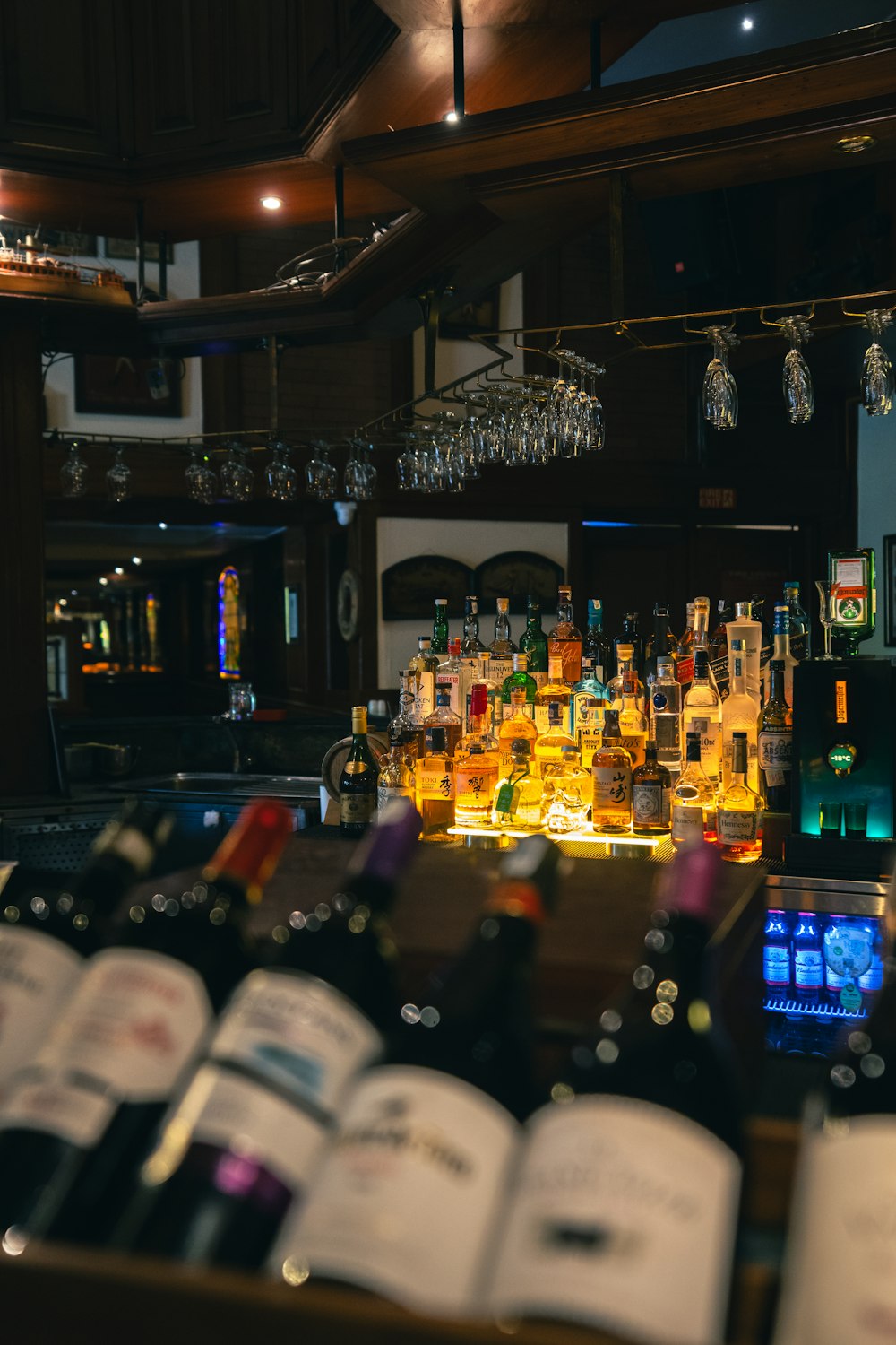 a bar with bottles of alcohol on it