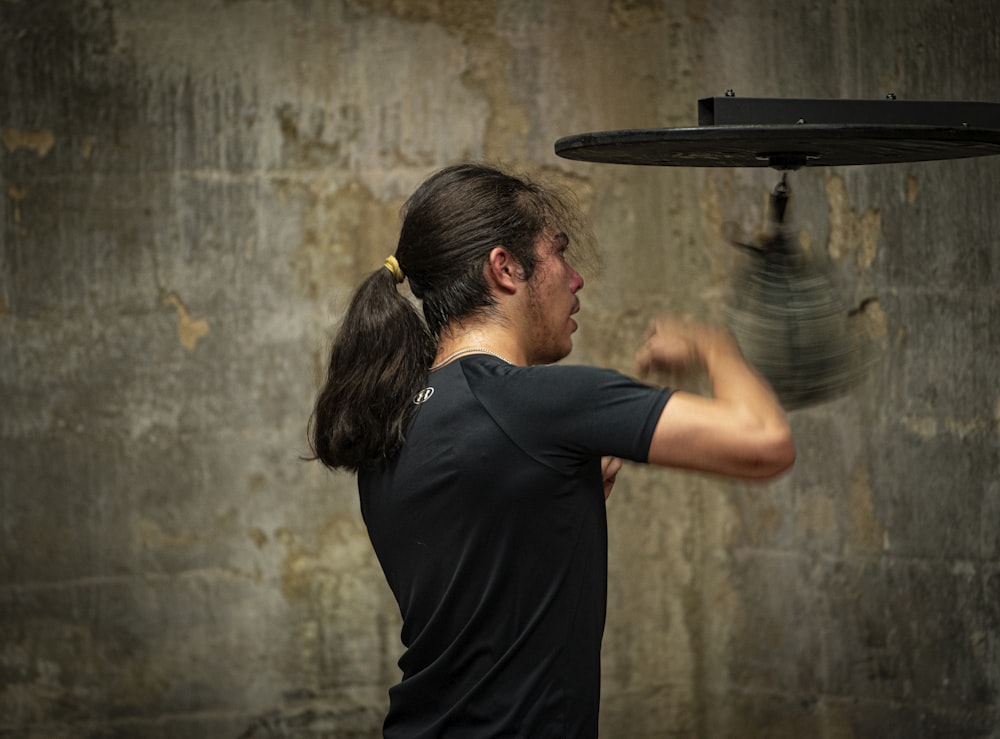 a man is throwing a frisbee in the air