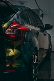 a car with a colorful design painted on it