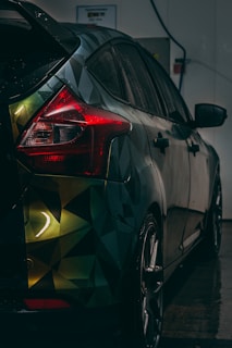 a car with a colorful design painted on it