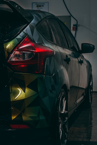 a car with a colorful design painted on it