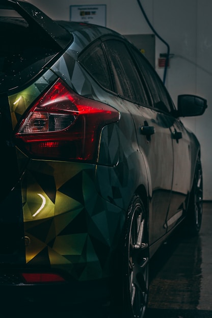 a car with a colorful design painted on it