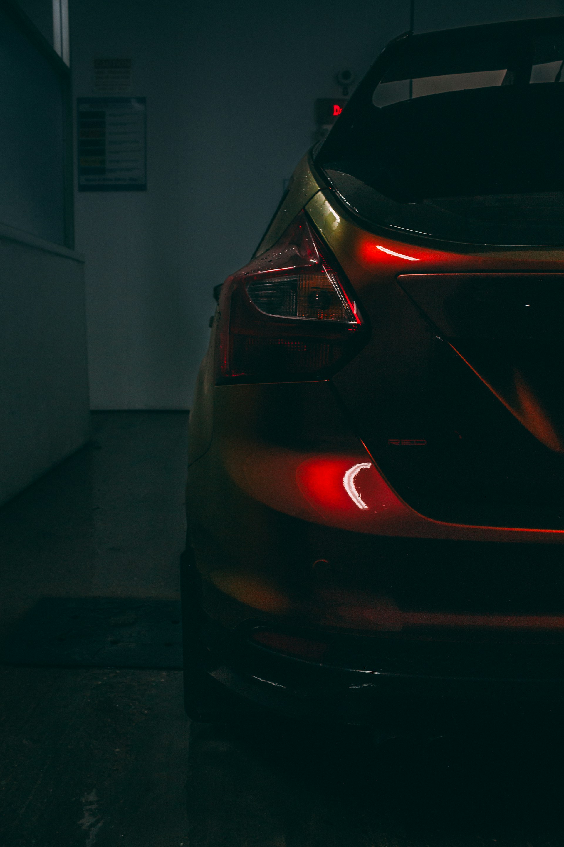 the back end of a car in a garage