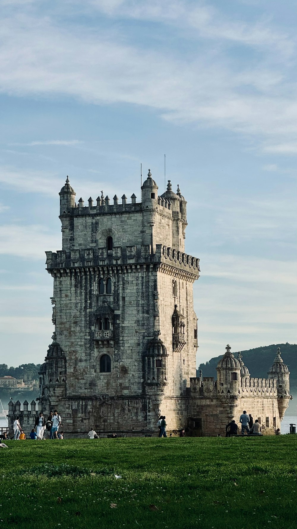 a tall tower with a clock on the top of it