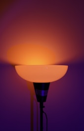 a lamp that is lit up in the dark