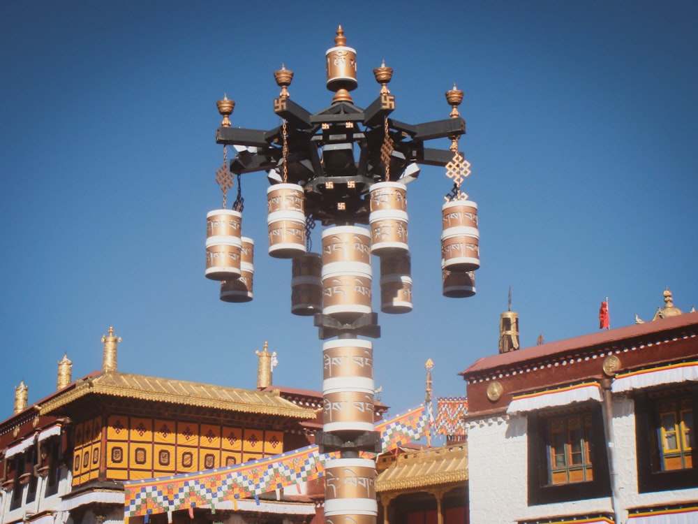 a street light in front of a row of buildings