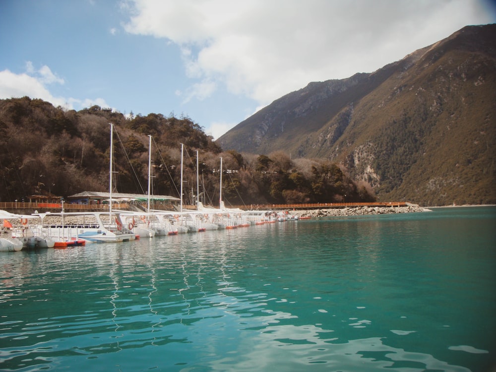 a bunch of boats that are sitting in the water