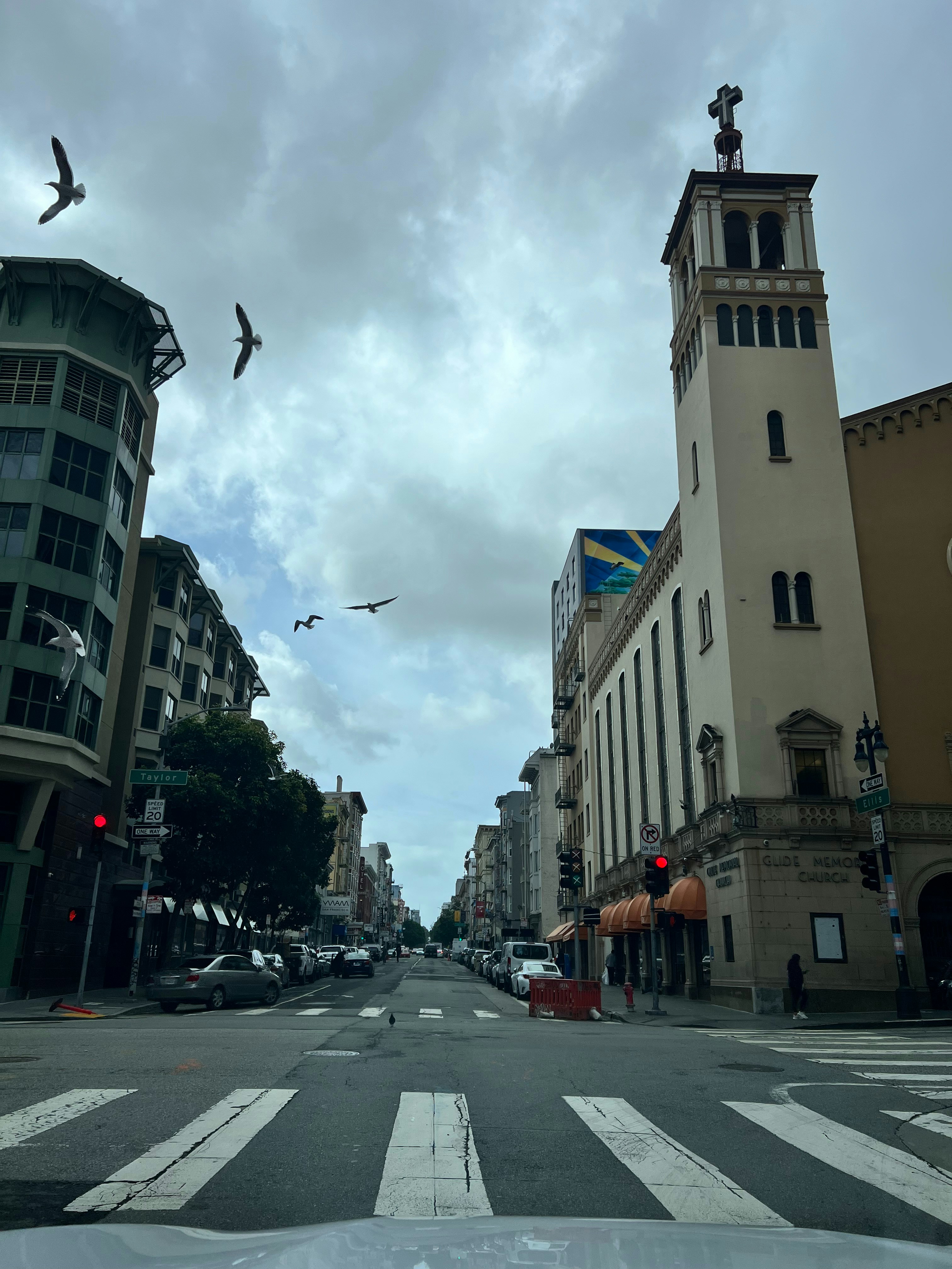 A city street filled with traffic and tall buildings photo – Free Car ...
